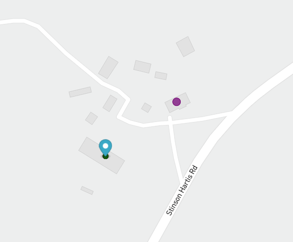 An overhead map, without satellite imagery. A challenge is denoted in purple