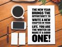 Paper on desk reading: "The new year: write a new chapter. Make it a good one!"