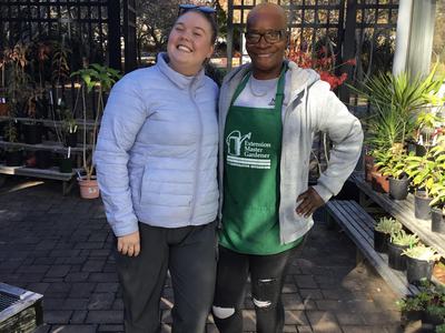 Sony Muldrow with Ability Garden intern at plant sale