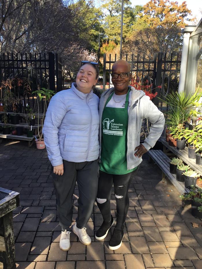 Sony Muldrow with Ability Garden intern at plant sale