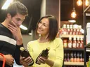 couple buying olive oil