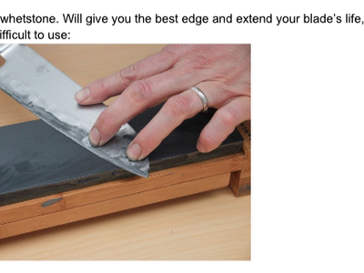 Hands holding a knife sharpening its blade on a whetstone; caption reads "Example of a whetstone."