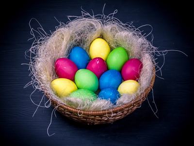 colorful eggs in a basket