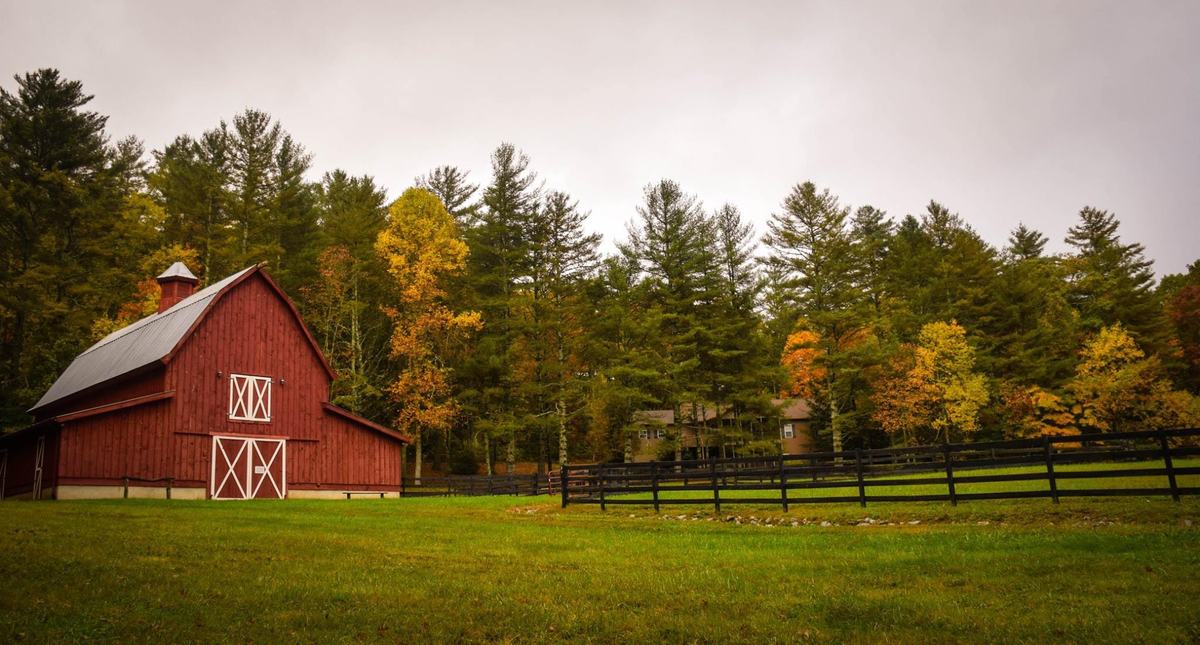 Red barn with field