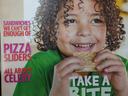 Curly-haired child holding a sandwich; magazine title "CHOP CHOP" and text "TAKE A BITE OUT OF SPRING"