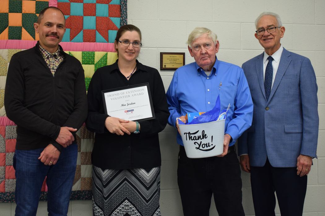 Friend of Extension Award Recipient, Mia Jordan with Urban Ag/Ag Education PA, Jeffrey Cates, and Forsyth County Commissioners Richard Linville and Dr. Don Martin