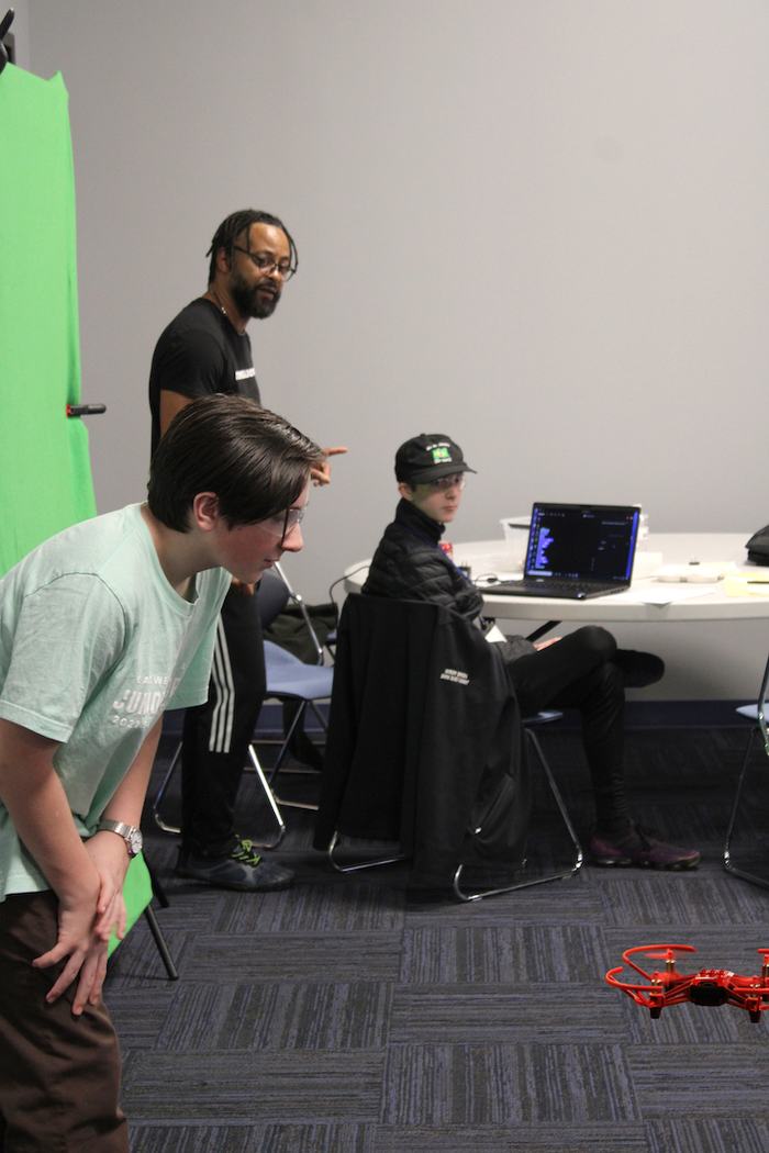 Caleb Schwartz and Andy Huffman of the Circuit Breakers 4-H Club monitor a flight together in preparation for 4-H’s Game of Drones contest.