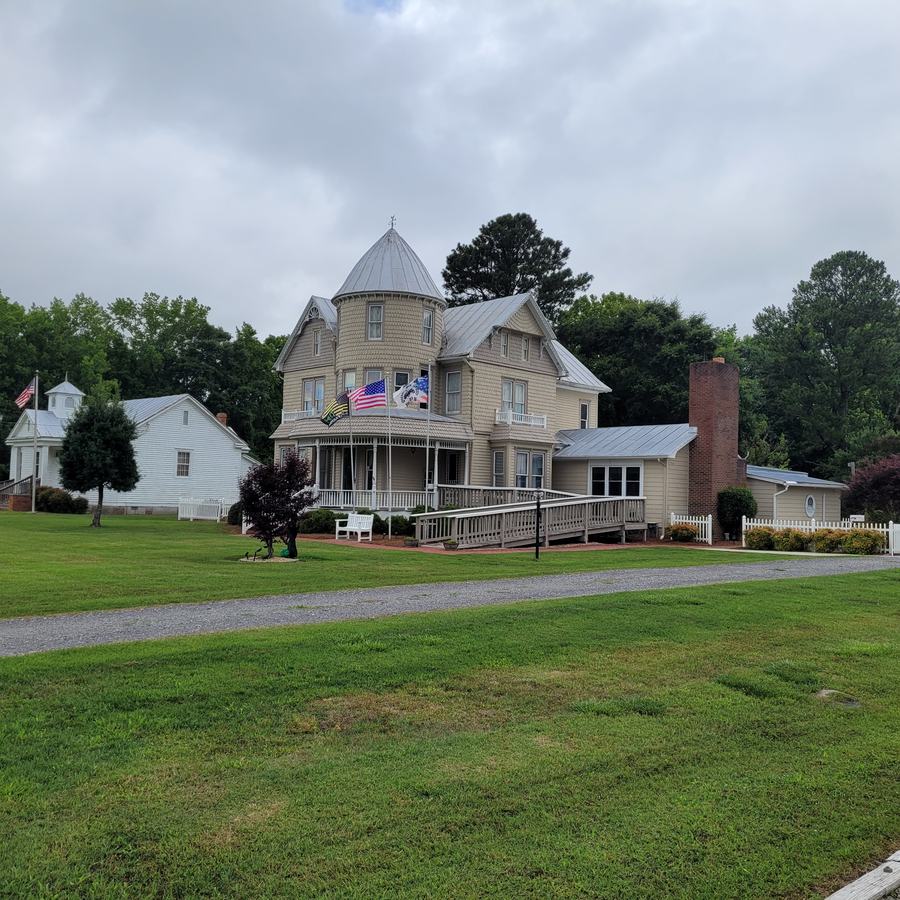An older home converted into a restaurant.