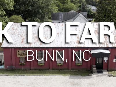 Rustic Roots restaurant building, parking lot