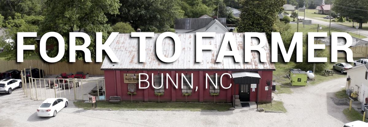 Rustic Roots restaurant building and parking lot