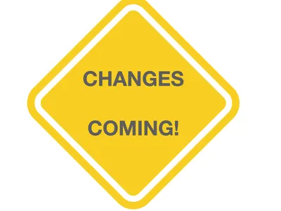 Yellow diamond sign with gray text "CHANGES COMING!"