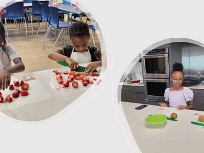 Children cutting strawberries and kiwis