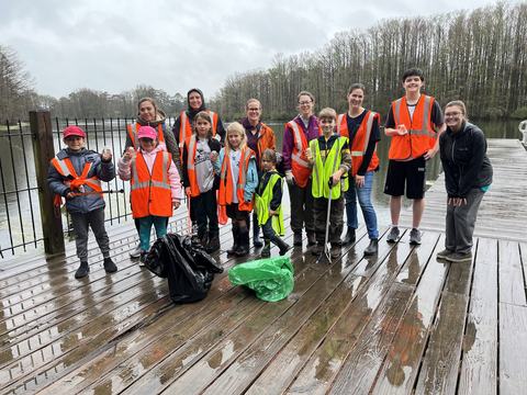 4-H Youth and Volunteers participating in a water sampling, analysis, and trash clean up day with Cape Fear River Watch.