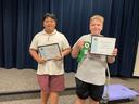 Thang Pham and Eli Dillion pose proudly with their awards from NC 4-H Electric Congress.