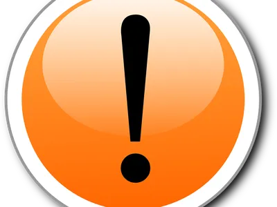 Exclamation point in an orange circle