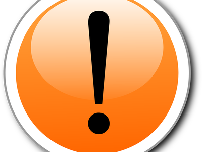 Exclamation point in an orange circle