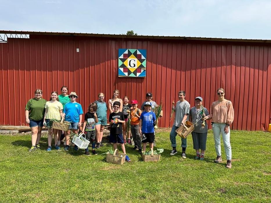 Our group holding their produce from Gales Farm