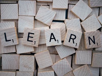 Learn spelled out in Scrabble letters