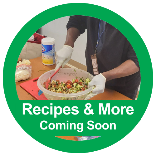 Person wearing gloves mixing salad in a bowl; text "Recipes & More Coming Soon"