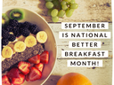 Bowl of fruit (strawberries, blackberries, banana, kiwi, chia), grapes and orange; text "SEPTEMBER IS NATIONAL BETTER BREAKFAST MONTH!"