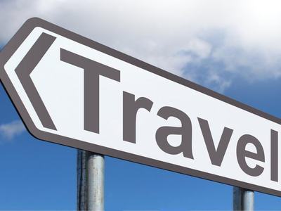Decorative - Sign with the word "Travel" pointing left