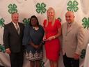 Picture of (left to right): Dr. Mike Yoder, Assoc. Director & State Program Leader, 4-H; Dr. Claudette Smith; Associate Administrator, N.C. A&T Extension Administration; Awards Recipient - Coleman Killinger, 4-H Youth Development Agent, N.C. Cooperative E