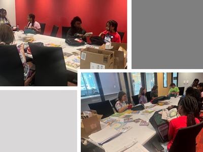 campers sitting at a conference table