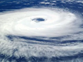 Satellite view of a hurricane with a clear eye over the ocean
