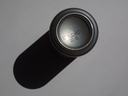 Aluminum can bottom with dot-printed code "27/10/2017 9:40" and elongated shadow