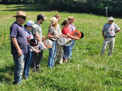 farmers learning about controlled grazing