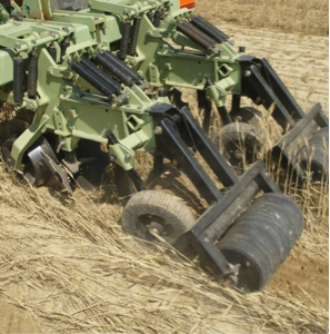 A strip tiller from the side.