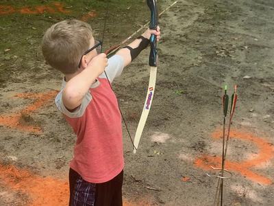 youth shooting archery