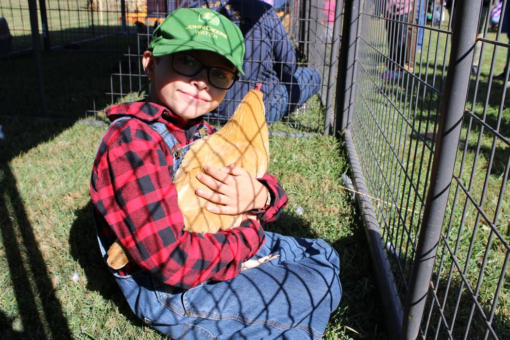 4-H Youth holding a hen