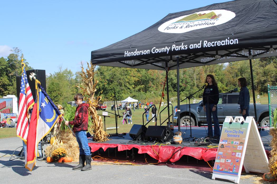 Henderson County Parks and Recreation tent and stage.