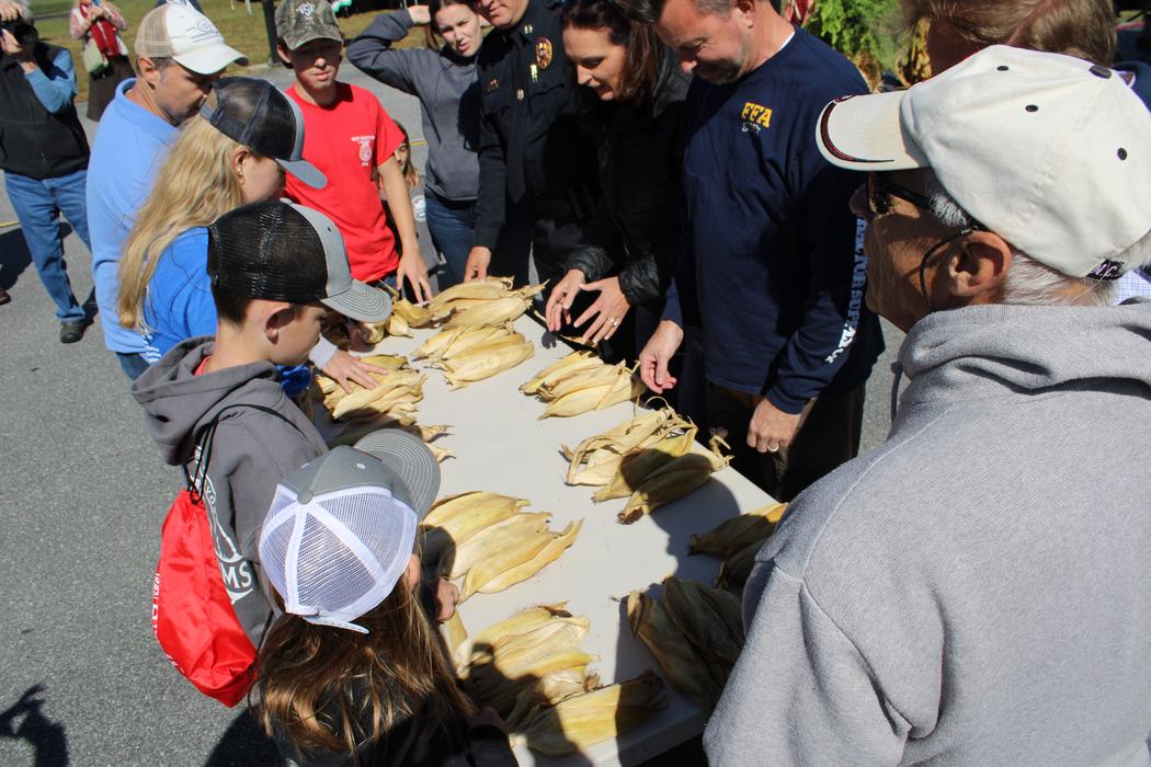 People get ready shuck corn.