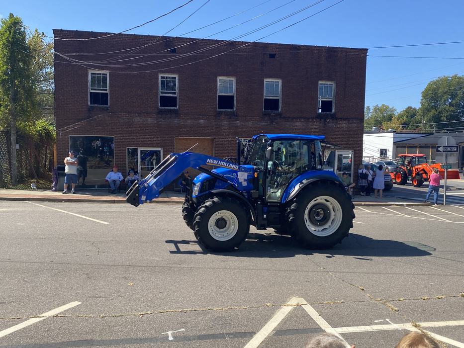 blue tractor in parade