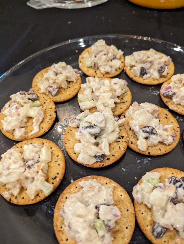 Chicken salad on crackers.