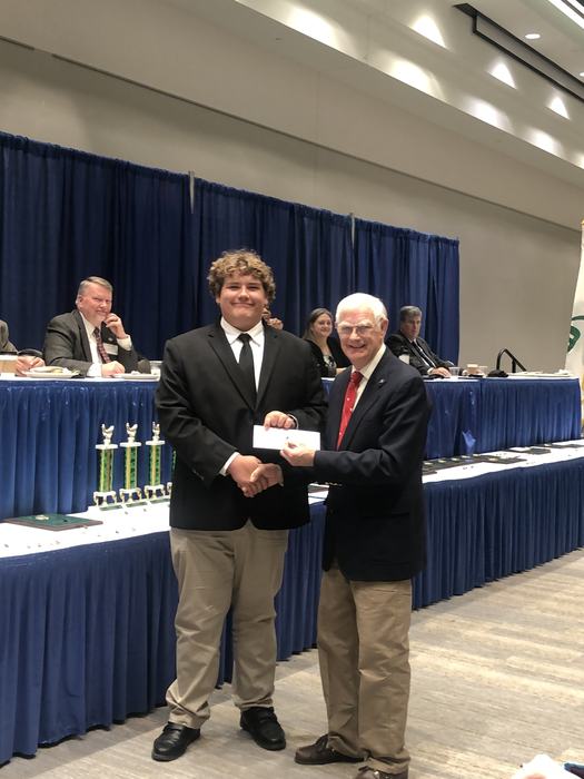 3rd place 4-H Chicken BBQ winner receiving award