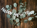 Happy New Year Banner with Greenery