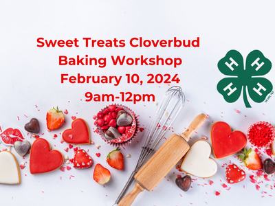 Red heart shaped cookies, strawberries, rolling pin