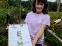 woman holding clipboard