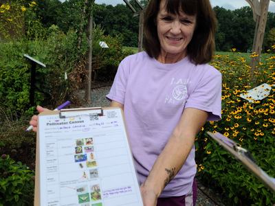 woman holding clipboard