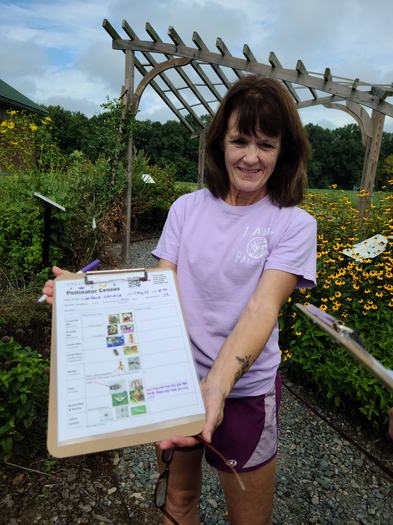 woman holding clipboard