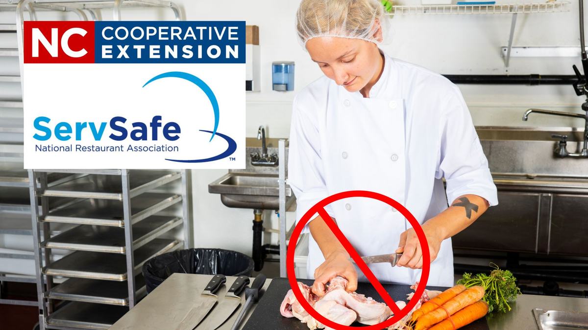 Woman cooking chicken on a stove