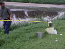 collecting wastewater sample