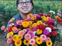 Der Holcomb with flowers harvested from her family farm