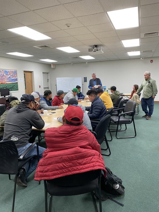 People learn together in a classroom.