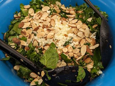 final product; kale arugula farro salad in a bowl