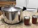 canner on counter with two jars