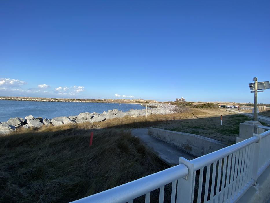 A rock covered shore.